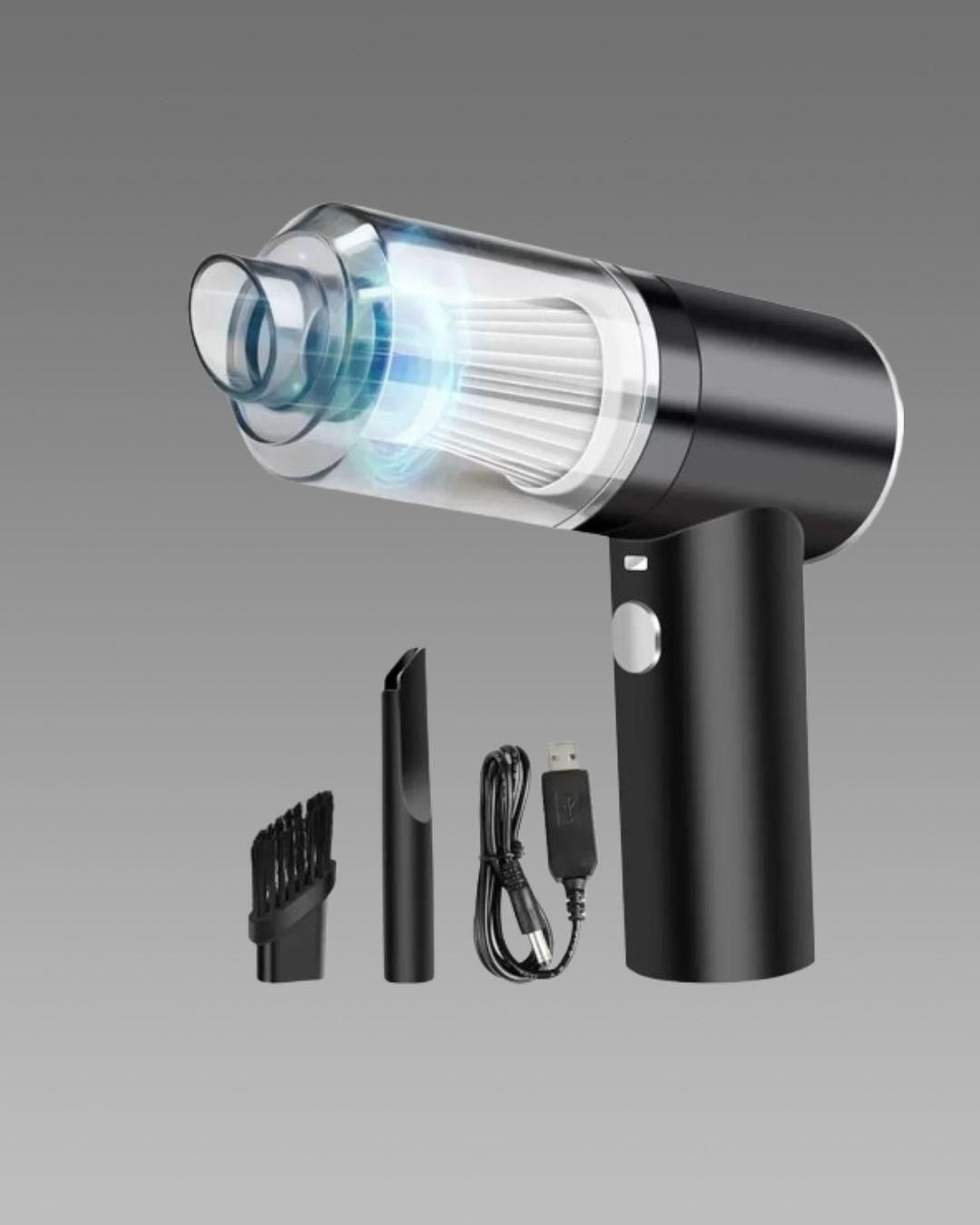 Black portable vacuum suction cleaner with transparent filter, USB charging cable, and two cleaning attachments