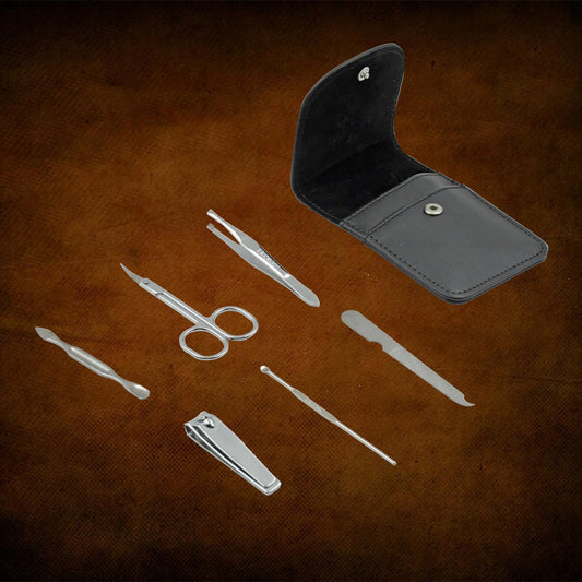 Professional nail care kit with stainless steel tools in a sleek black case for at-home grooming