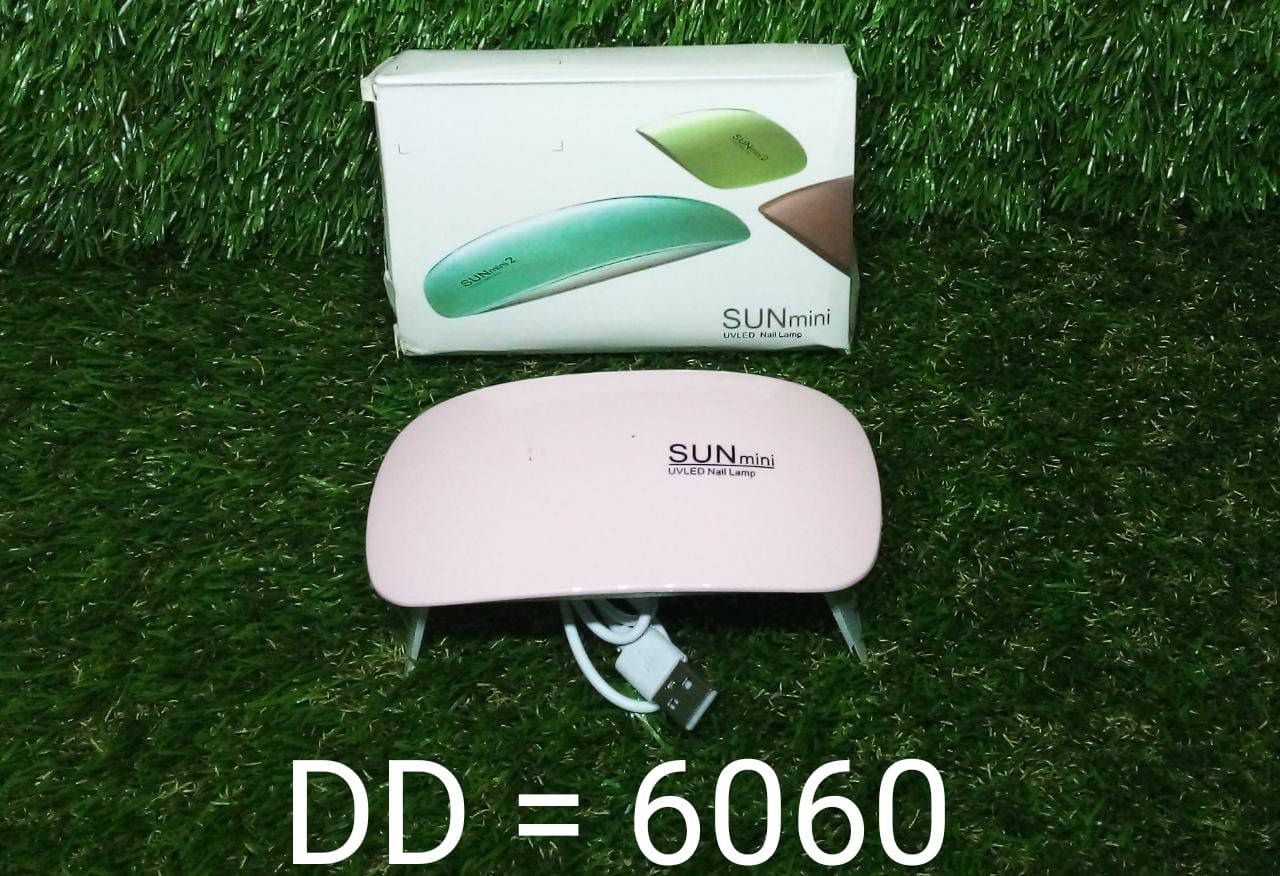 Your Brand SUNmini professional nail polish dryer machine in pink color for quick drying