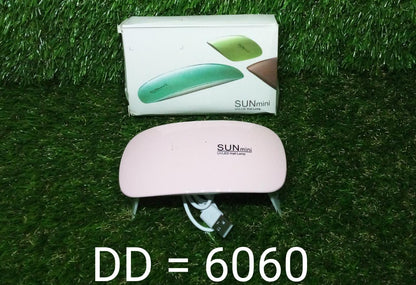 Your Brand SUNmini professional nail polish dryer machine in pink color for quick drying