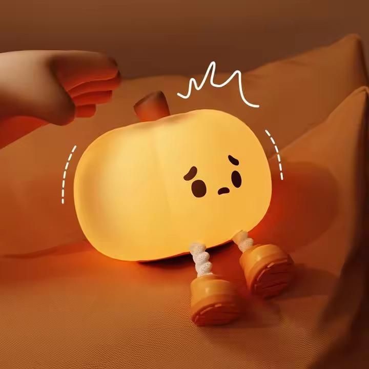 THE GIR FARMER touch control silicone lamp shaped like a cute glowing pumpkin with expressive face and flexible legs