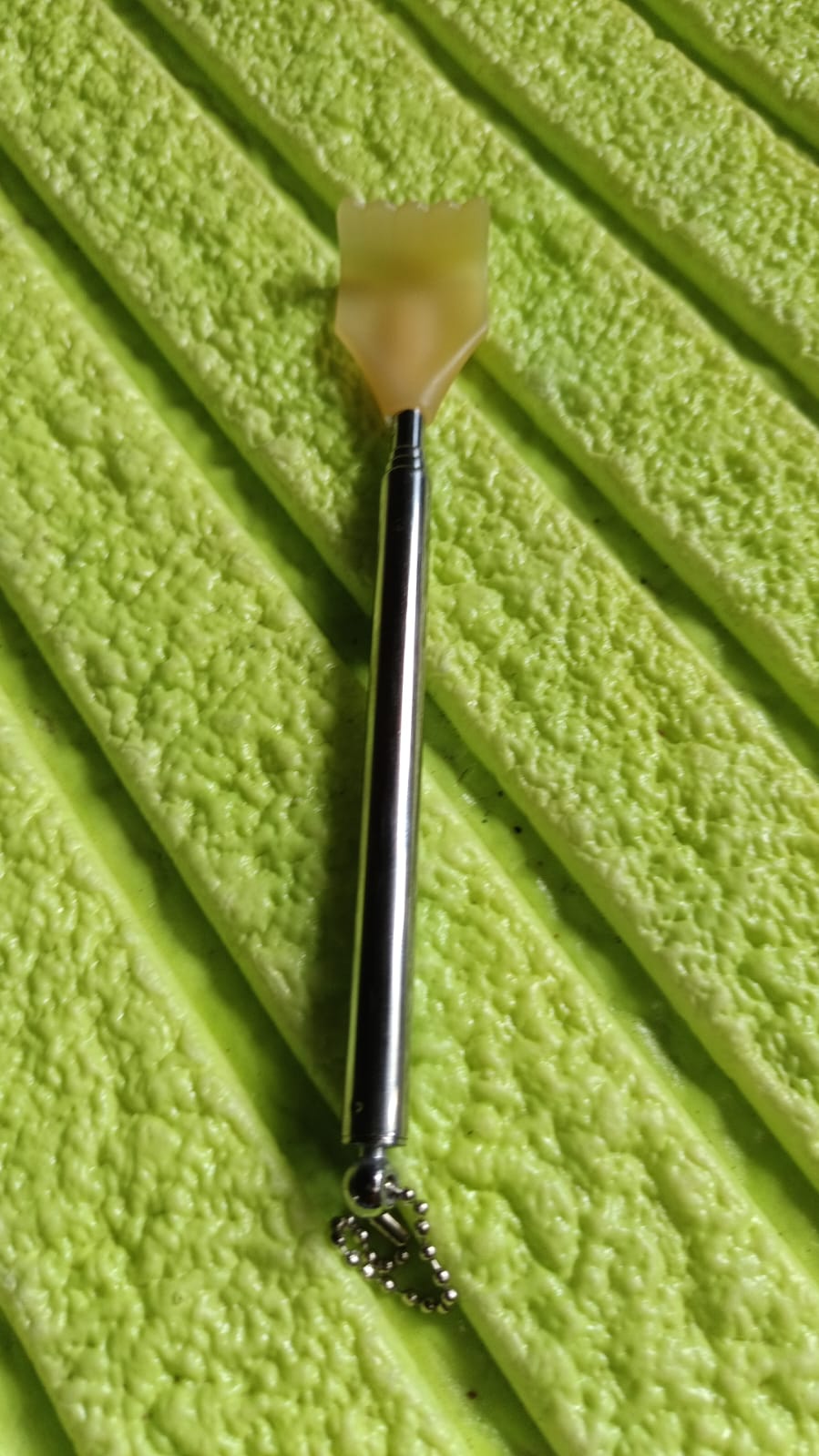 Retractable metal back scratcher with a sleek design for easy comfort and relief