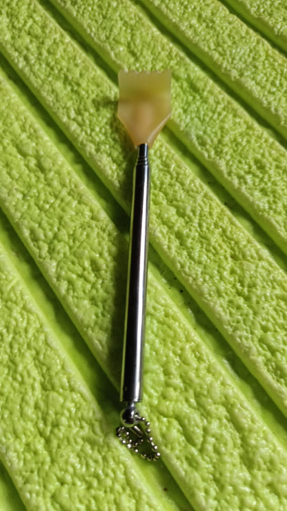 Retractable metal back scratcher with a sleek design for easy comfort and relief
