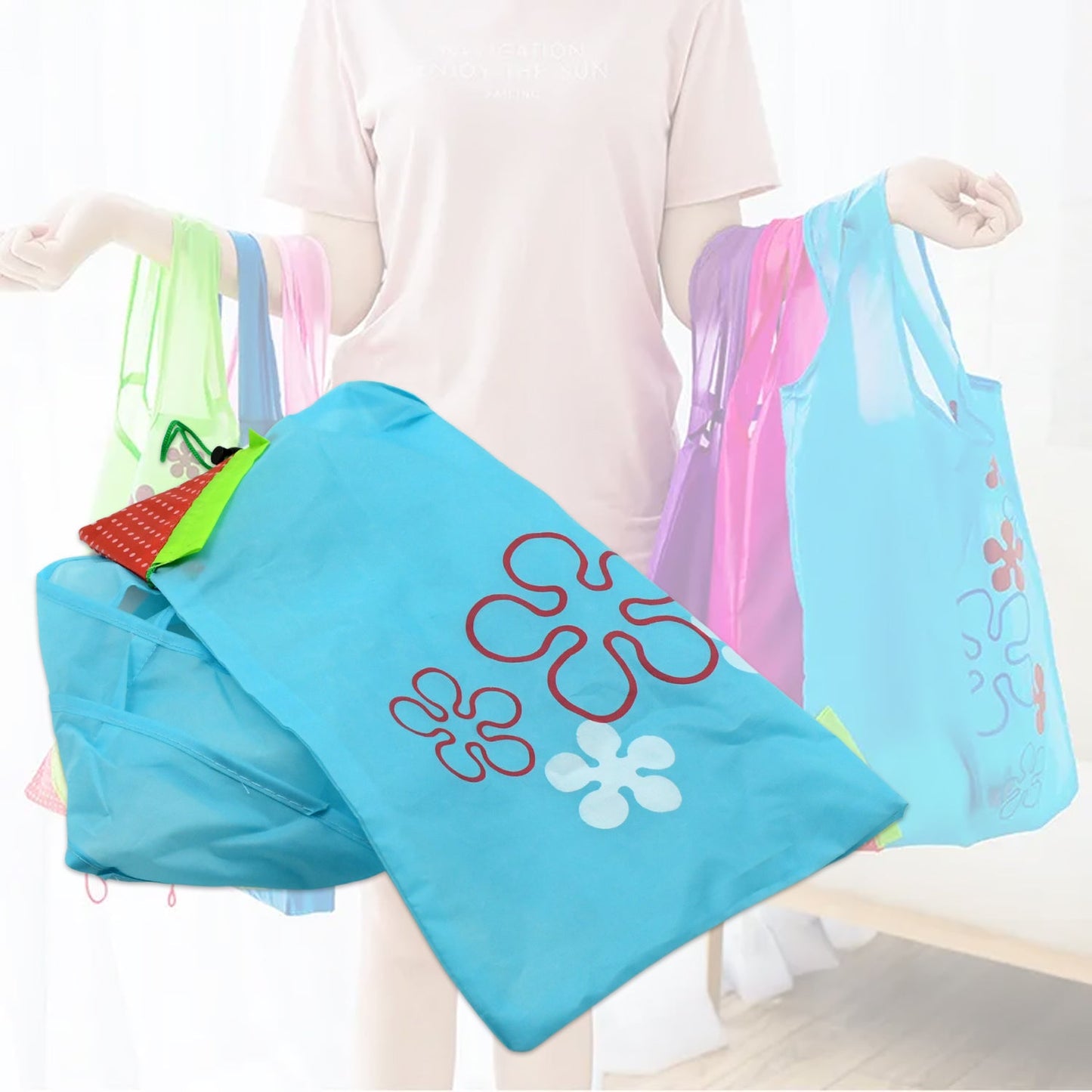 Colorful reusable grocery bag with handles displayed by a person for eco-friendly shopping