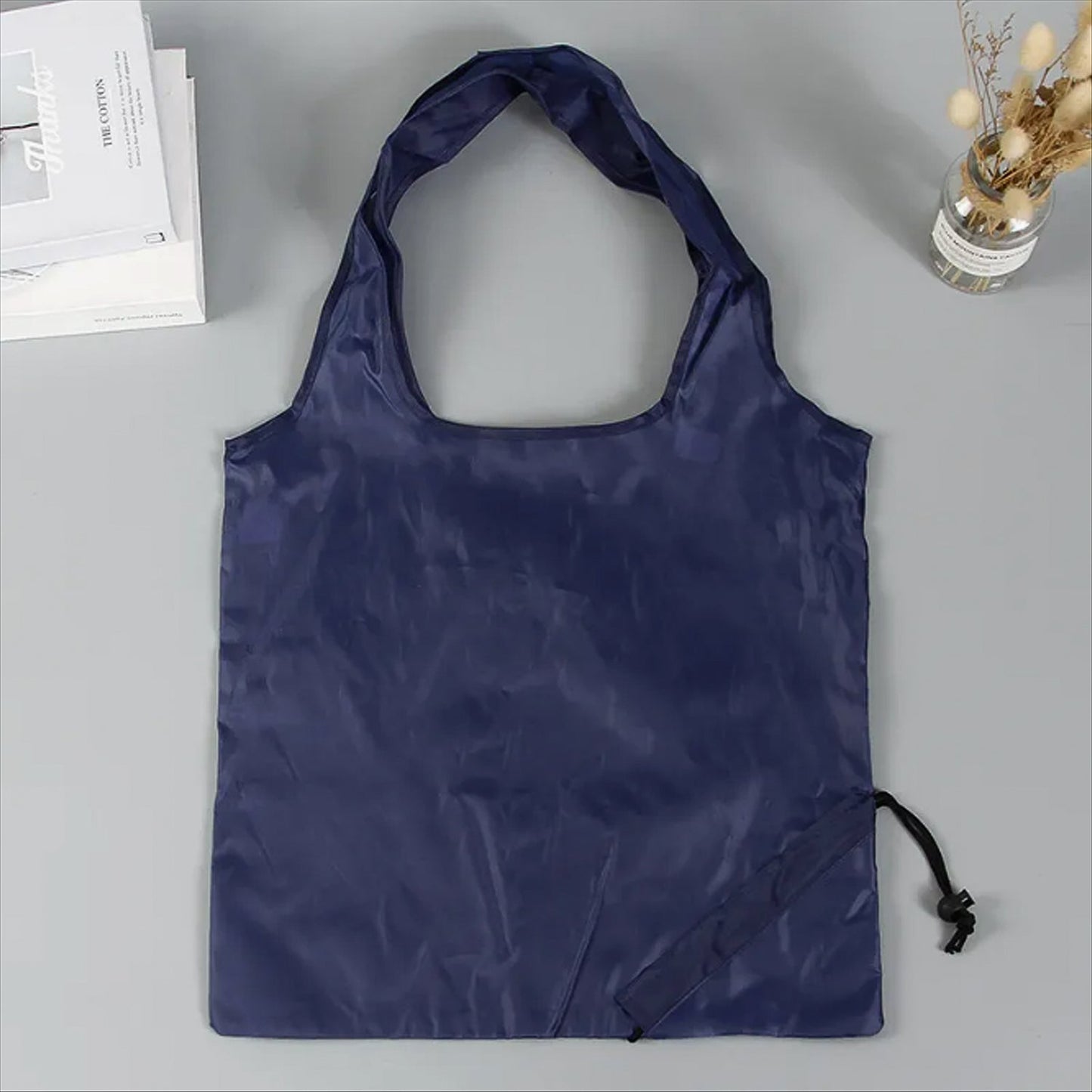 Navy reusable grocery bag with handles, perfect for eco-friendly shopping and daily use