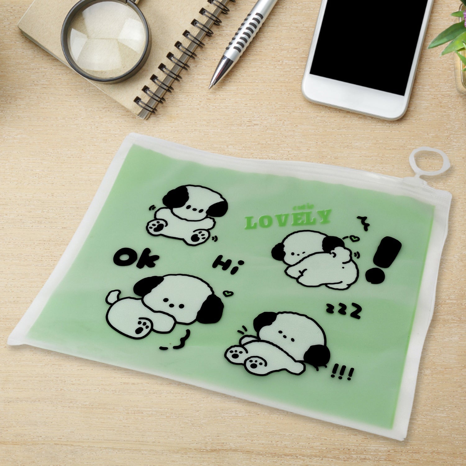Green reusable multipurpose pouch for kids featuring cute cartoon dogs and playful text