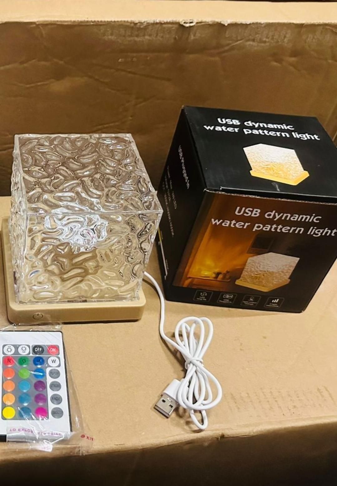 Rotating water ripple night light with remote control and USB connection for soothing ambiance