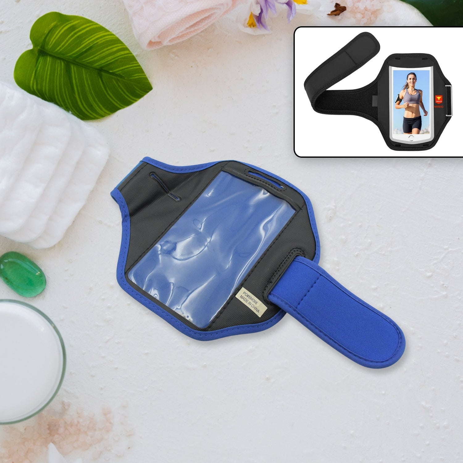running armband phone holder in blue with transparent pocket for easy access during workouts