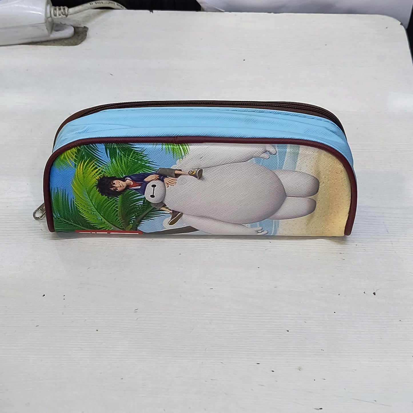 Amd-Deodap school pencil case for children featuring playful cartoon characters and a blue zipper