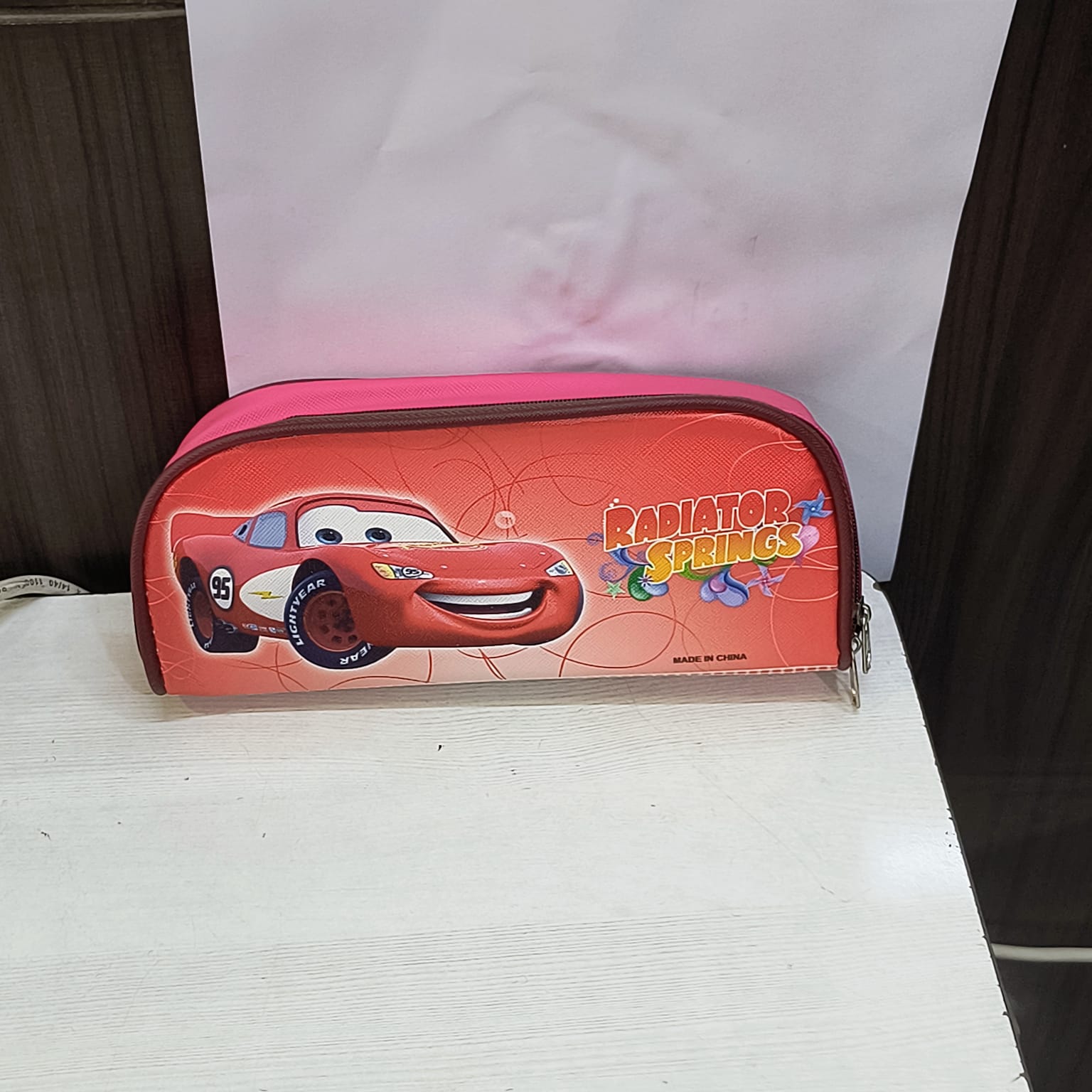 Radiator Springs themed school pencil case for children in red and pink with car design