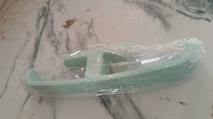 Self adhesive bathroom towel rack in mint green packaging for easy installation