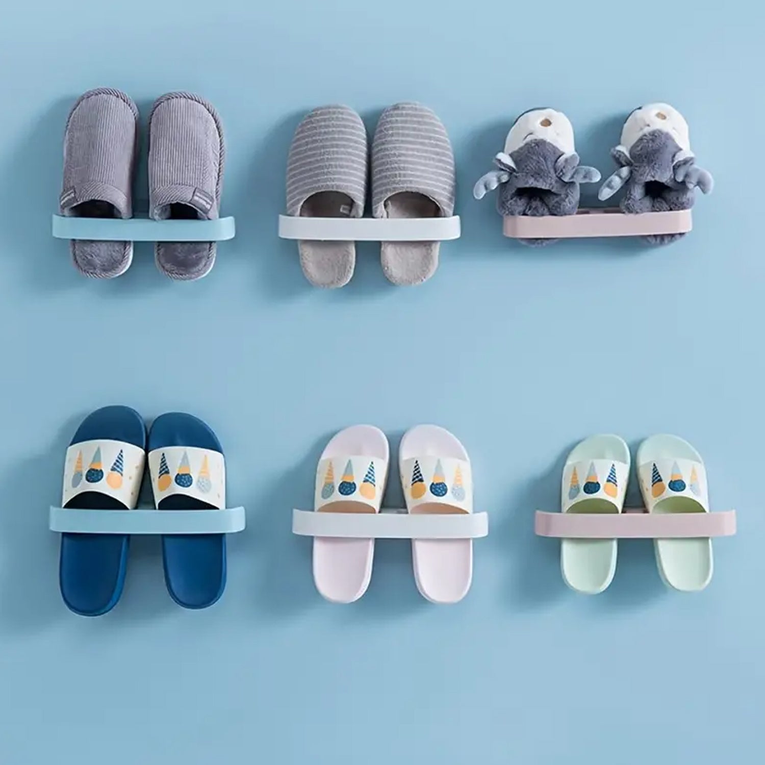 Decorative self adhesive bathroom towel rack holding stylish slippers and plush toys on a blue wall