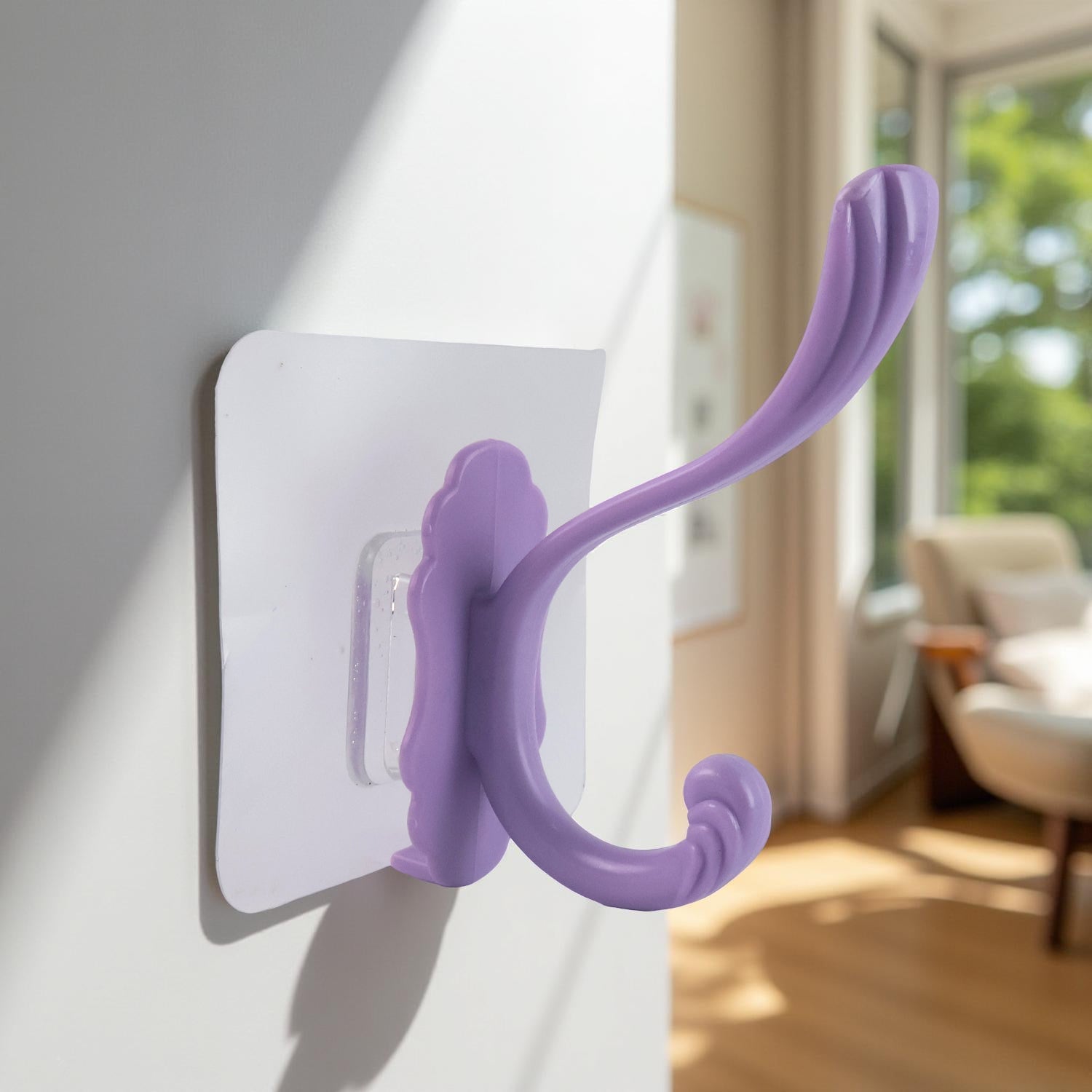 Self-adhesive heavy duty wall hook in purple for easy home organization and space saving