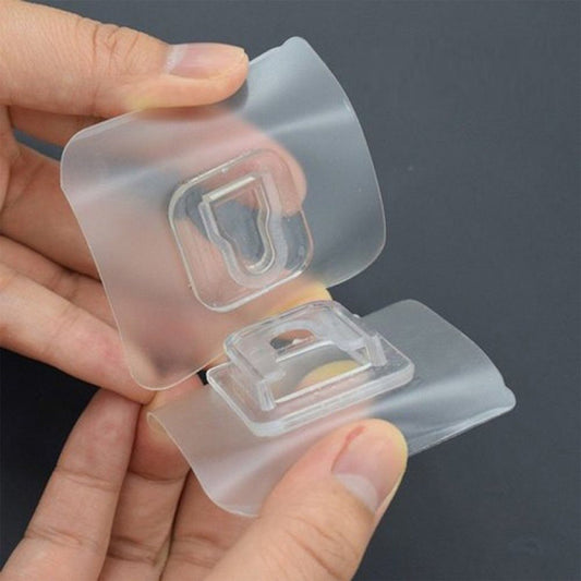 Self adhesive transparent wall hook for easy installation and organization in home improvement projects