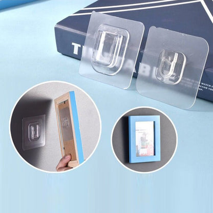 Self adhesive transparent wall hook for easy hanging of frames and decor without damage