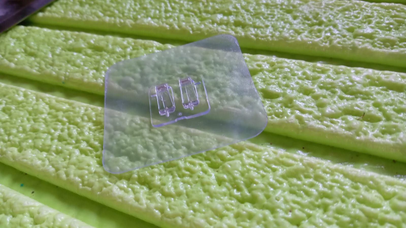 Clear self adhesive wall hooks for convenient hanging solutions on smooth surfaces