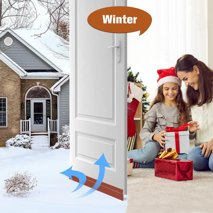 Self-adhesive wood floor transition strip installed under door to prevent cold winter air from entering home