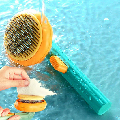 THE GIR FARMER self cleaning pet comb with orange bristle head and teal handle being rinsed under water