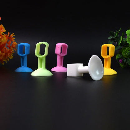 Self-sucking silicone door stopper set in various colors for secure door holding