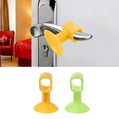 Self-sucking silicone door stopper in yellow and green to secure doors and prevent slamming