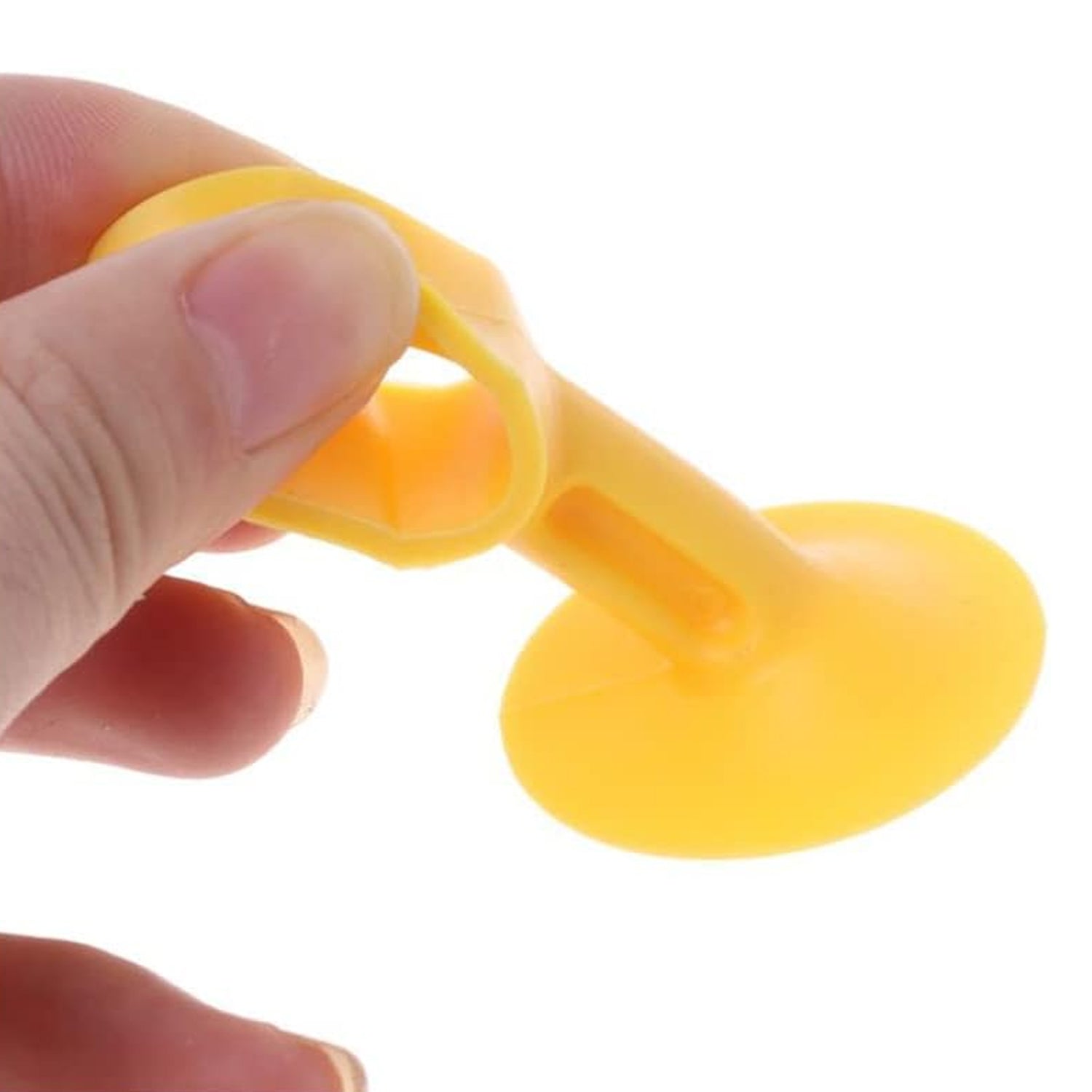 Bright yellow self-sucking silicone door stopper designed for effective door security and stability