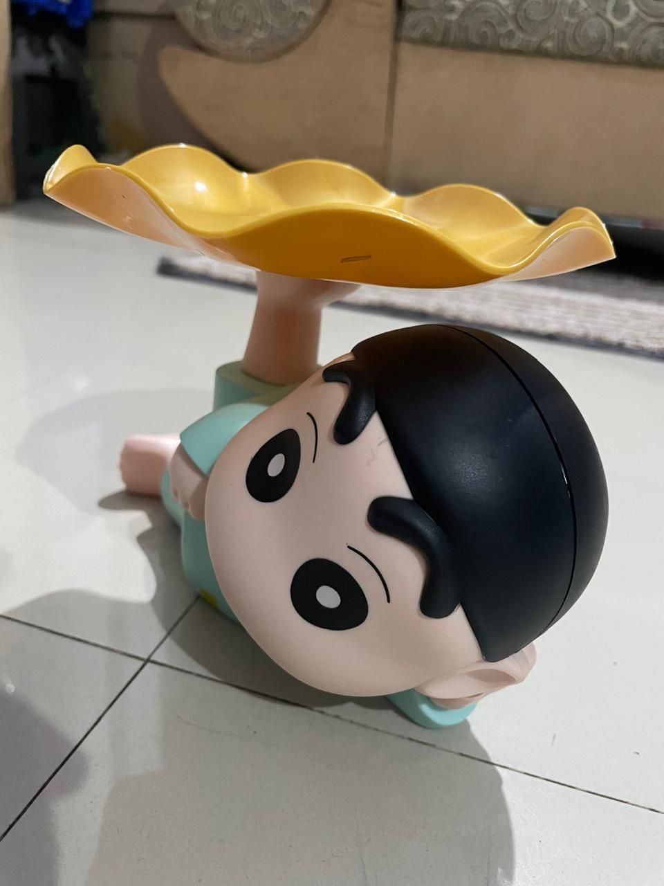 Cute Shinchan tray holder featuring a playful design that adds charm to your space