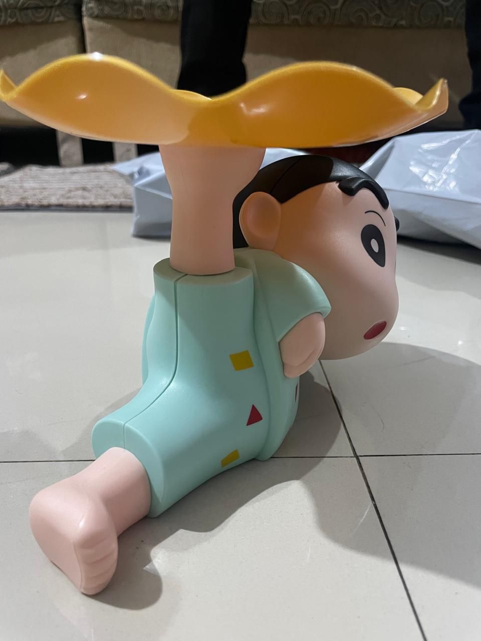 Shinchan tray holder designed for fun and practical use in holding snacks and drinks