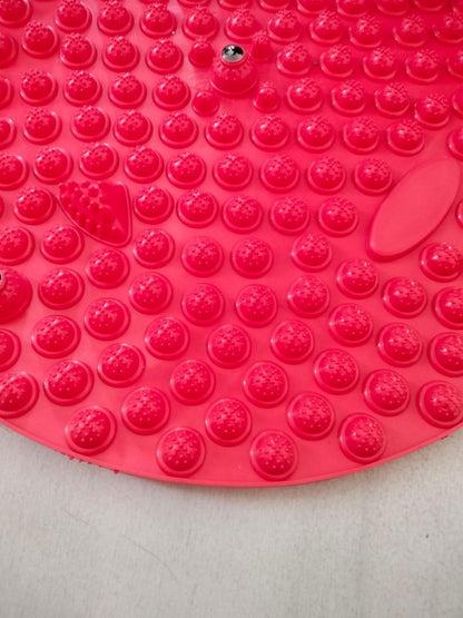 Red silicone foot massage pad with raised textured nodes for effective foot reflexology and comfort