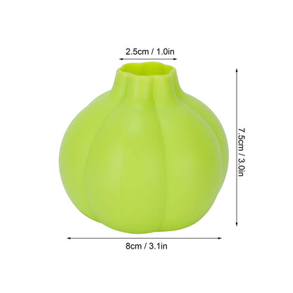 Bright green silicone garlic peeler for easy and efficient garlic peeling in the kitchen