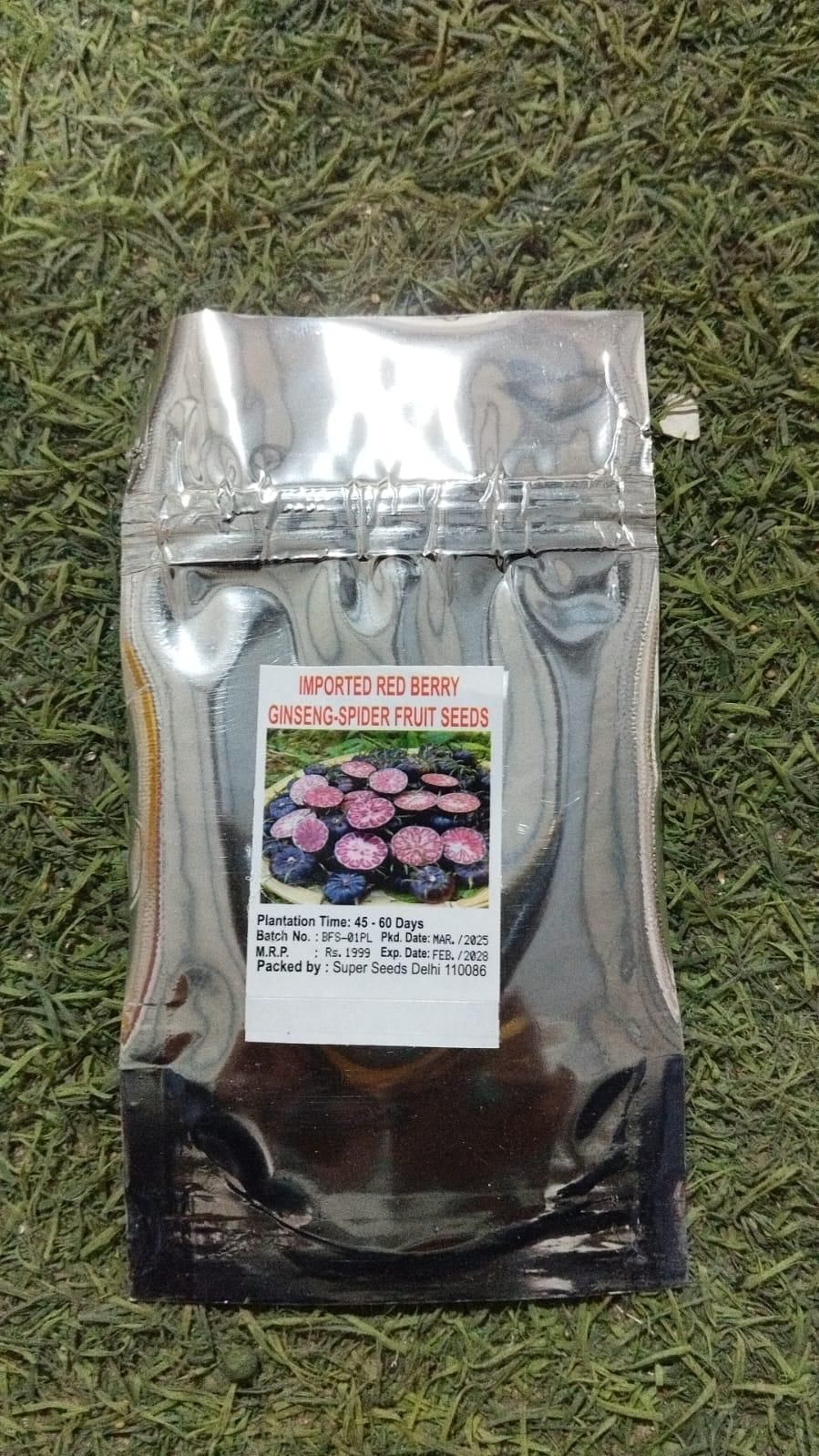 The Gir Farmer pure red ginseng berries for sale packaged in a silver foil pouch with label on grass background