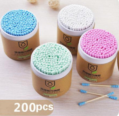 The Gir Farmer soft wood stick cotton swabs in blue white pink and green with 200 pieces in each container