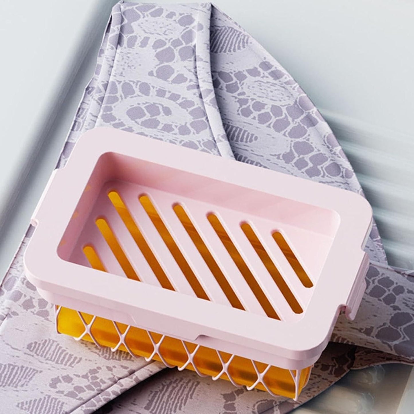 Pink soap mesh holder with drainage design for effective soap drying and storage