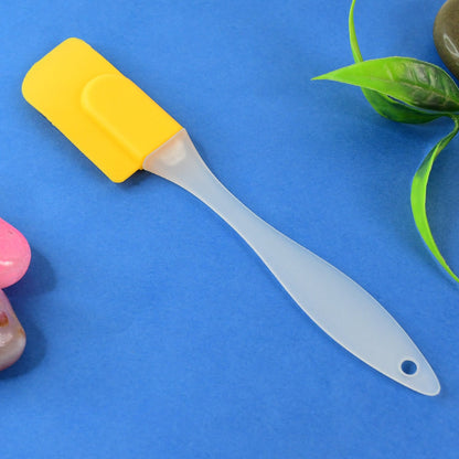Flexible silicone spatula with a yellow head ideal for cooking and baking by Your Brand