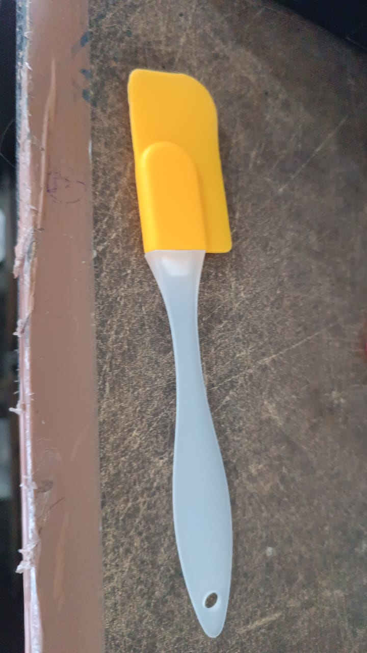Yellow Silicone Spatula with a Flexible Edge for Easy Mixing and Scraping