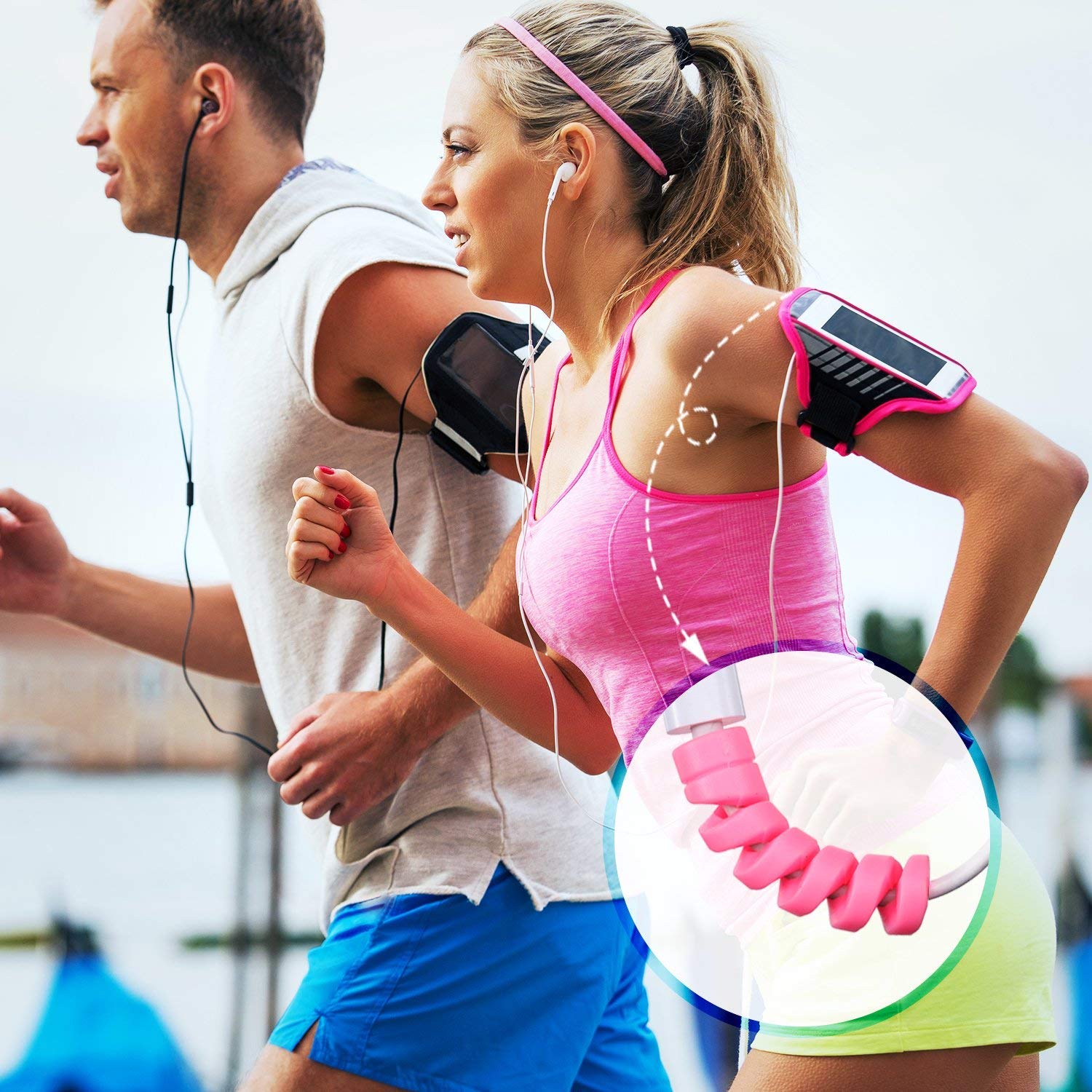Spiral charger cable protector showcased on running couples' armbands, keeping cords tangle-free during workouts