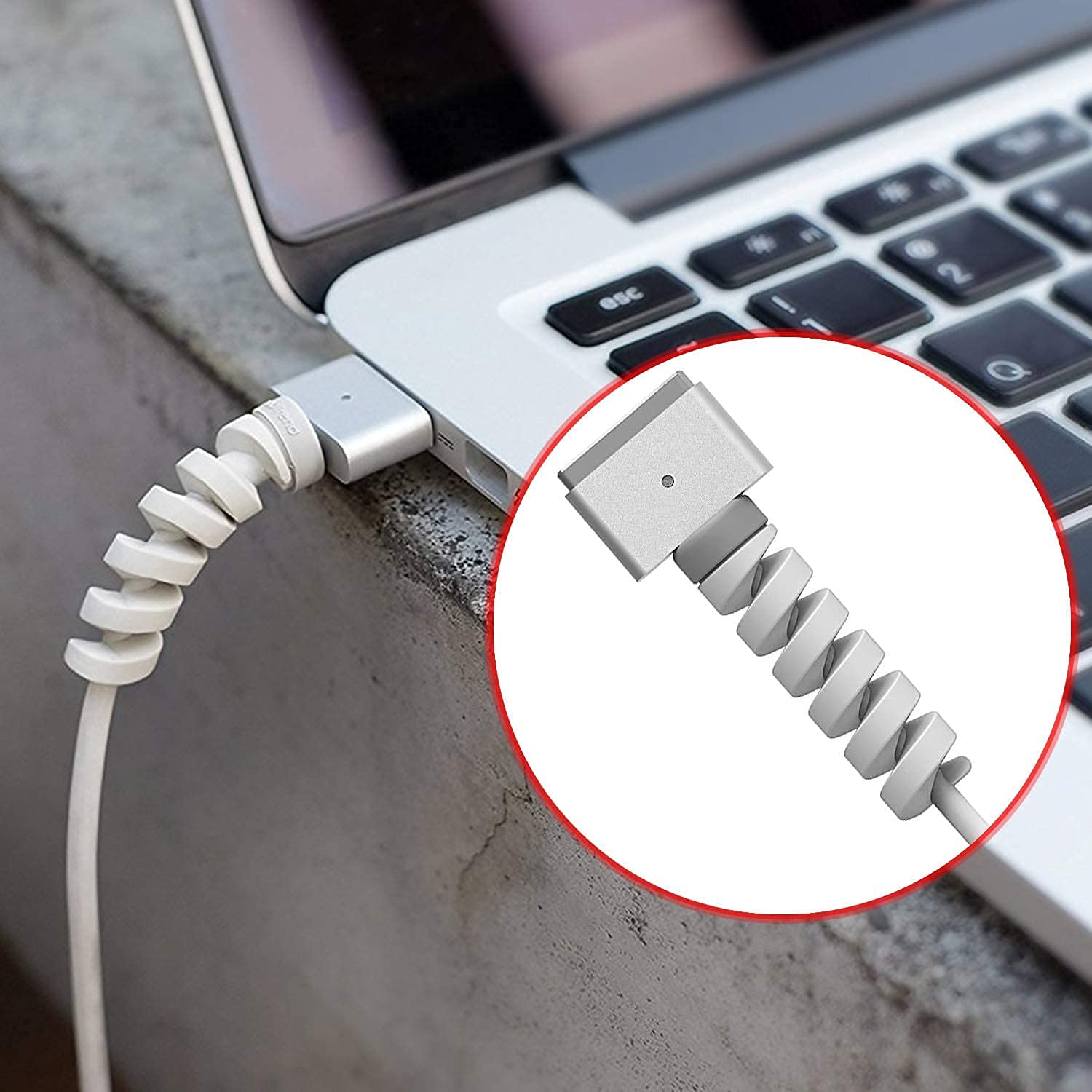 Spiral charger cable protector in white designed to prevent cable damage and improve durability