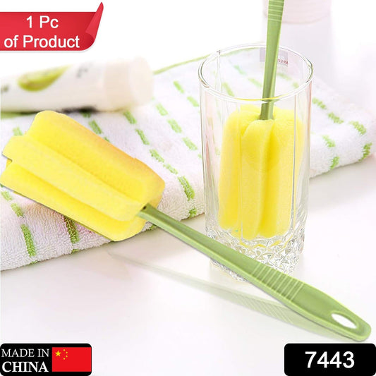 Sponge head kitchen cleaning tool with a green handle and yellow sponges for efficient cleaning