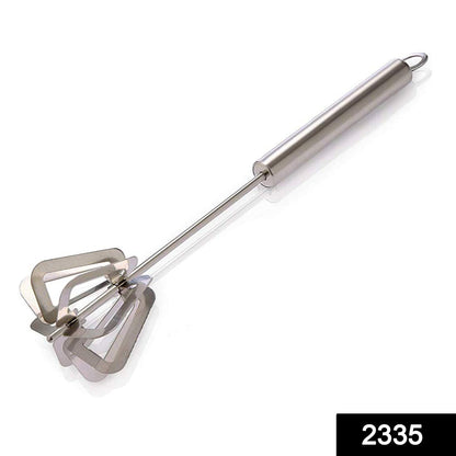 Stainless steel hand blender with ergonomic handle and unique blending blades for kitchen use