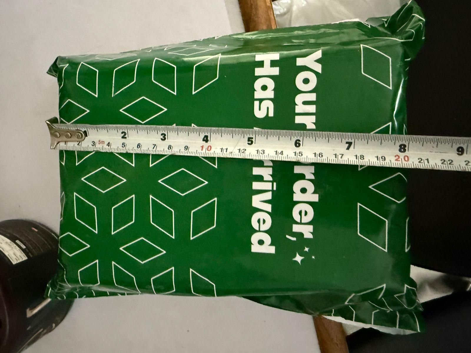 Packaging of stainless steel pet grooming glove with a measuring tape for size reference