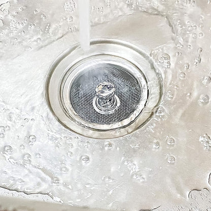 Your Brand stainless steel sink strainer in action, filtering water in a kitchen sink
