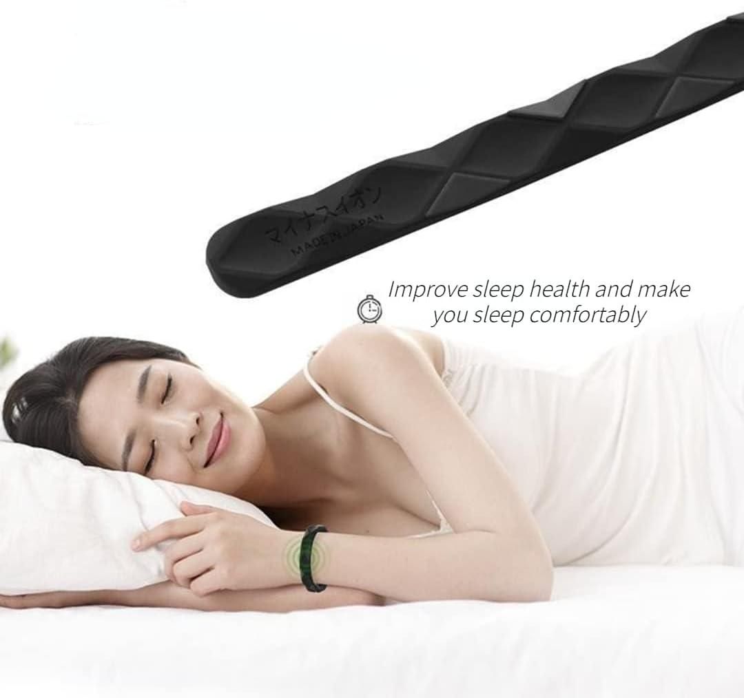 Woman sleeping comfortably while wearing a sugar control silicon band on her wrist for better health