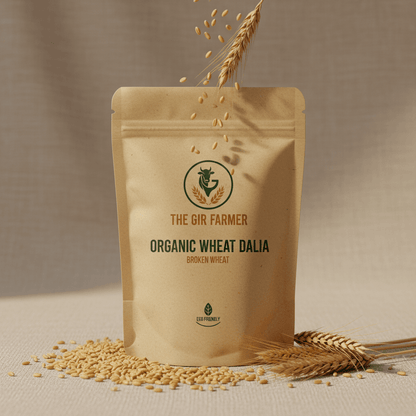 The Gir Farmer Organic Wheat Dalia packaging featuring broken wheat with grains spilling out for healthy cooking
