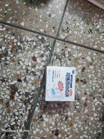 THE GIR FARMER toilet bowl bubble cleaner tablets package with Japanese text on terrazzo tile floor