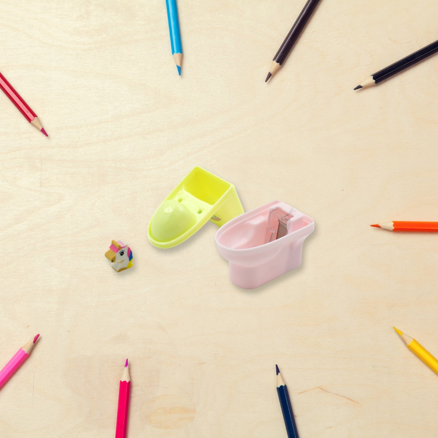 Colorful toilet shaped pencil sharpener with eraser, perfect for fun stationery collections