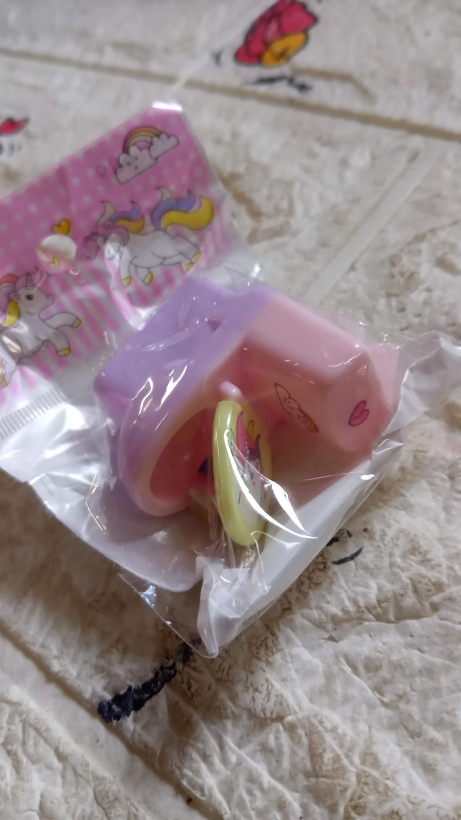 Colorful toilet shaped pencil sharpener with eraser in packaging, perfect for fun stationery