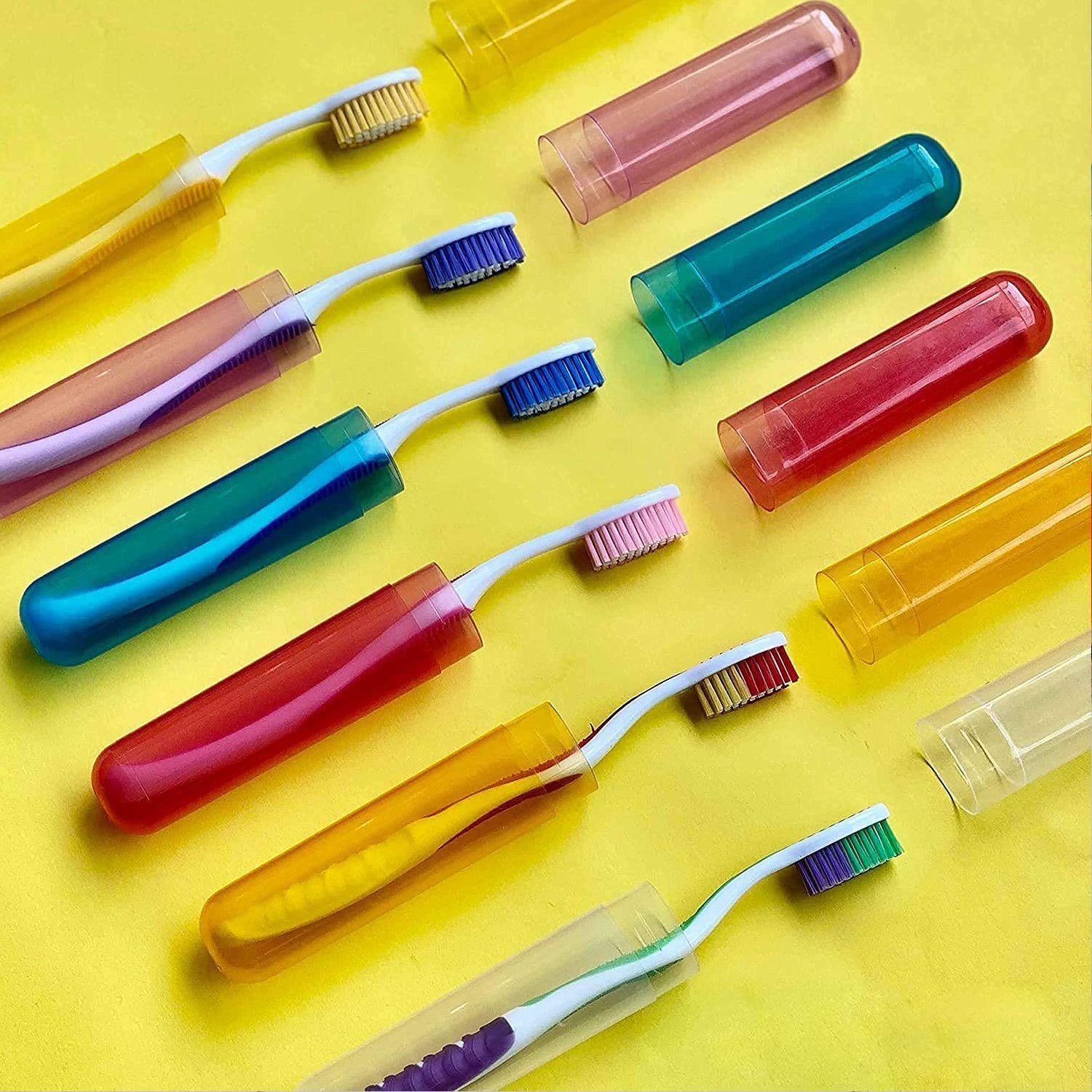 Colorful toothbrush travel covers with multiple toothbrushes for safe storage on the go