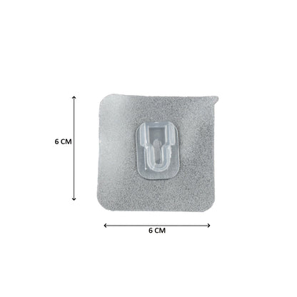 Transparent adhesive hook for wall measuring 6 cm by 6 cm, perfect for home organization