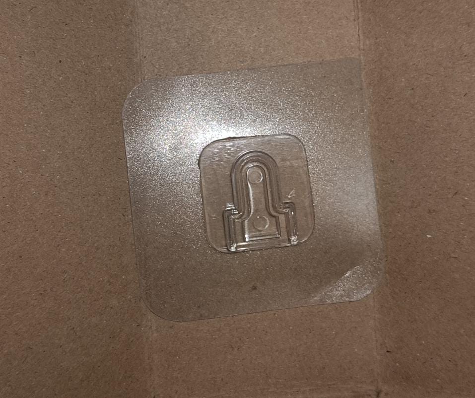 Transparent adhesive hook for wall designed for easy mounting without damage