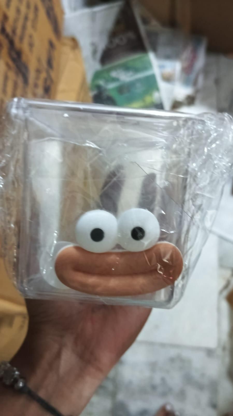 Unique transparent drawer storage box with playful cartoon character design and googly eyes