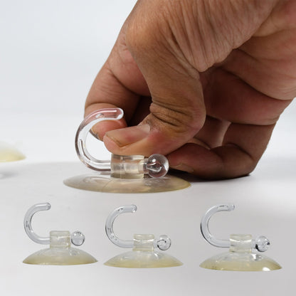 Transparent rubber vacuum hangers being applied for secure mounting and organization